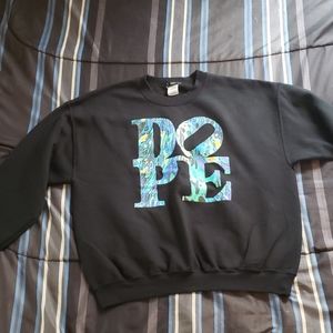 A long sleeve shirt with the word Dope on it